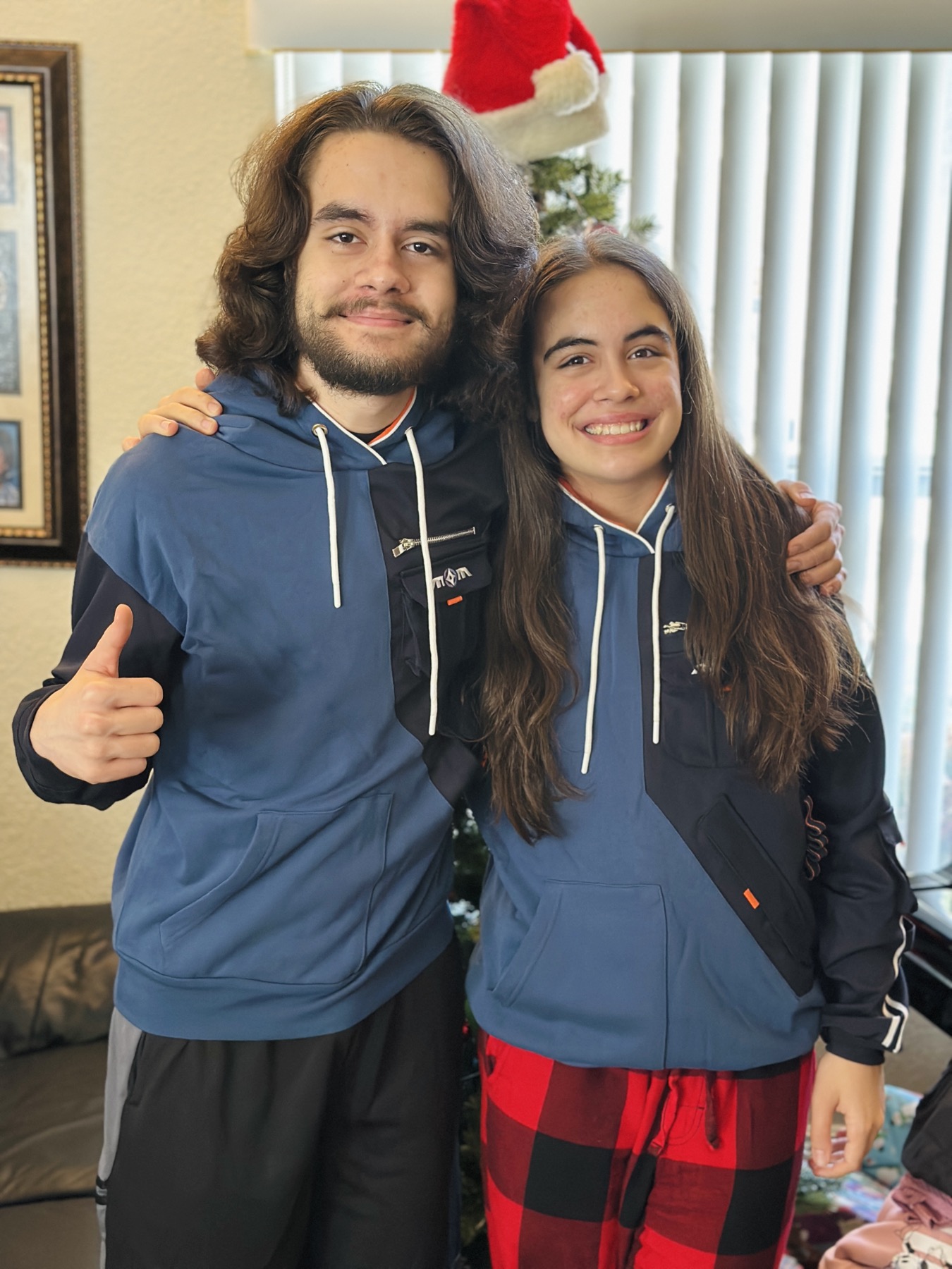 Jake and Sky, brother and sister, at home